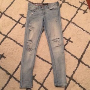 Blue washed denim ripped jeans